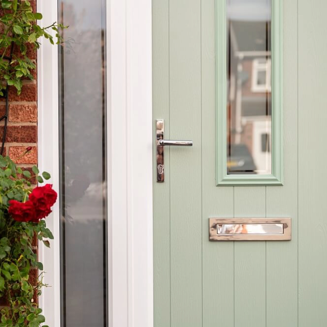 Composite door with side panel